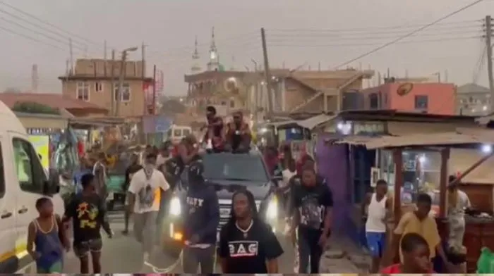 Blacko storms Nima streets with Nigerian superstar Asake (Watch Video)